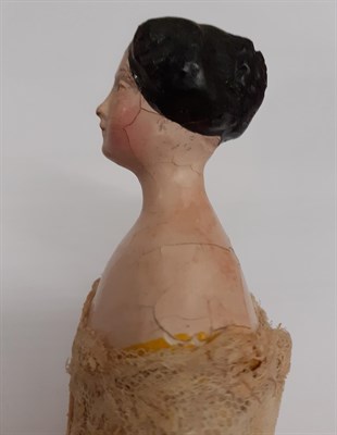 Lot 6005 - Early 19th Century Papier Mache Head and Shoulder Doll, with black painted hair, pink cheeks...
