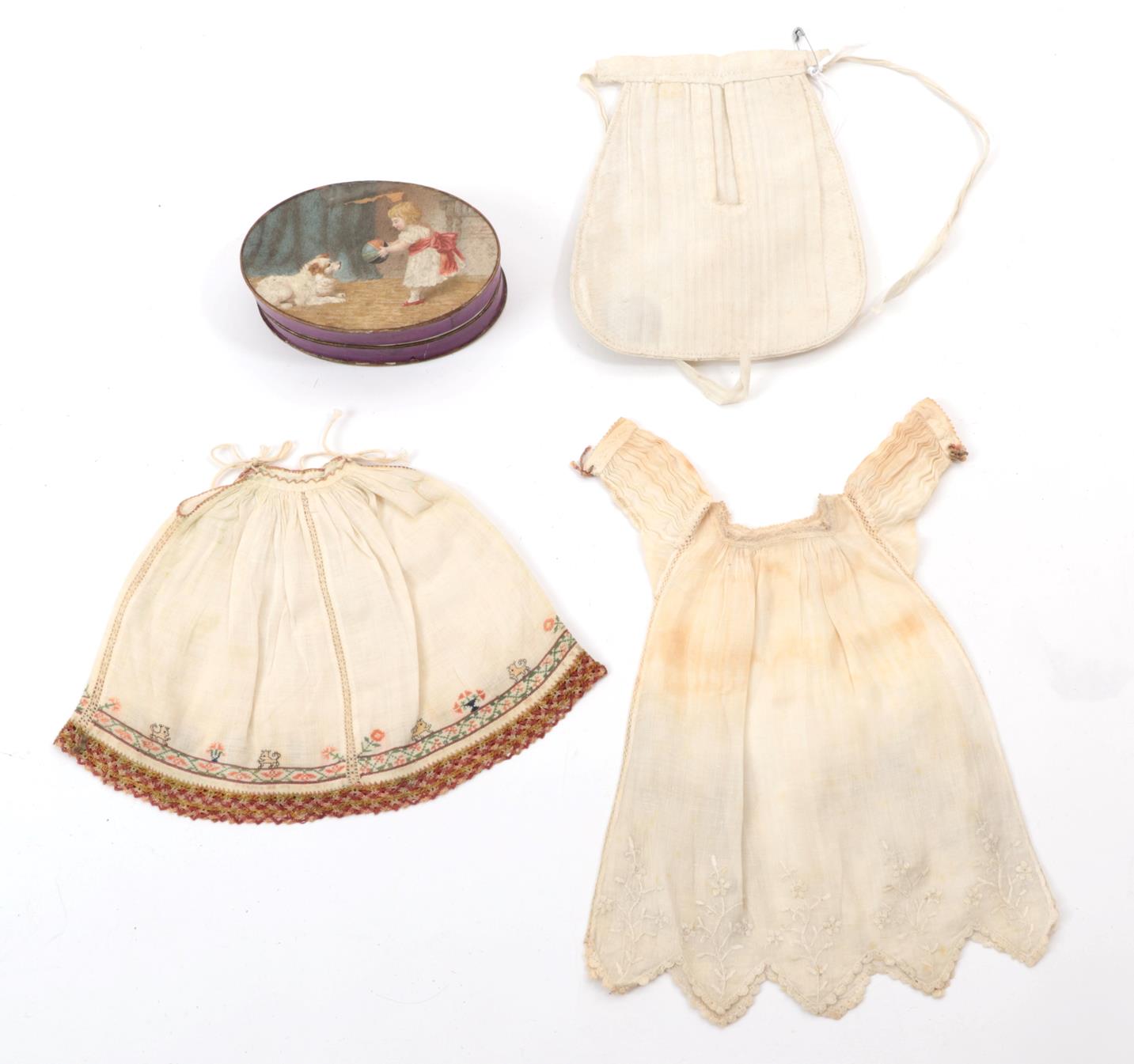 Lot 6010 - 19th Century Dolls Costume, including a white cotton pocket, a white dress with zig zag hem...