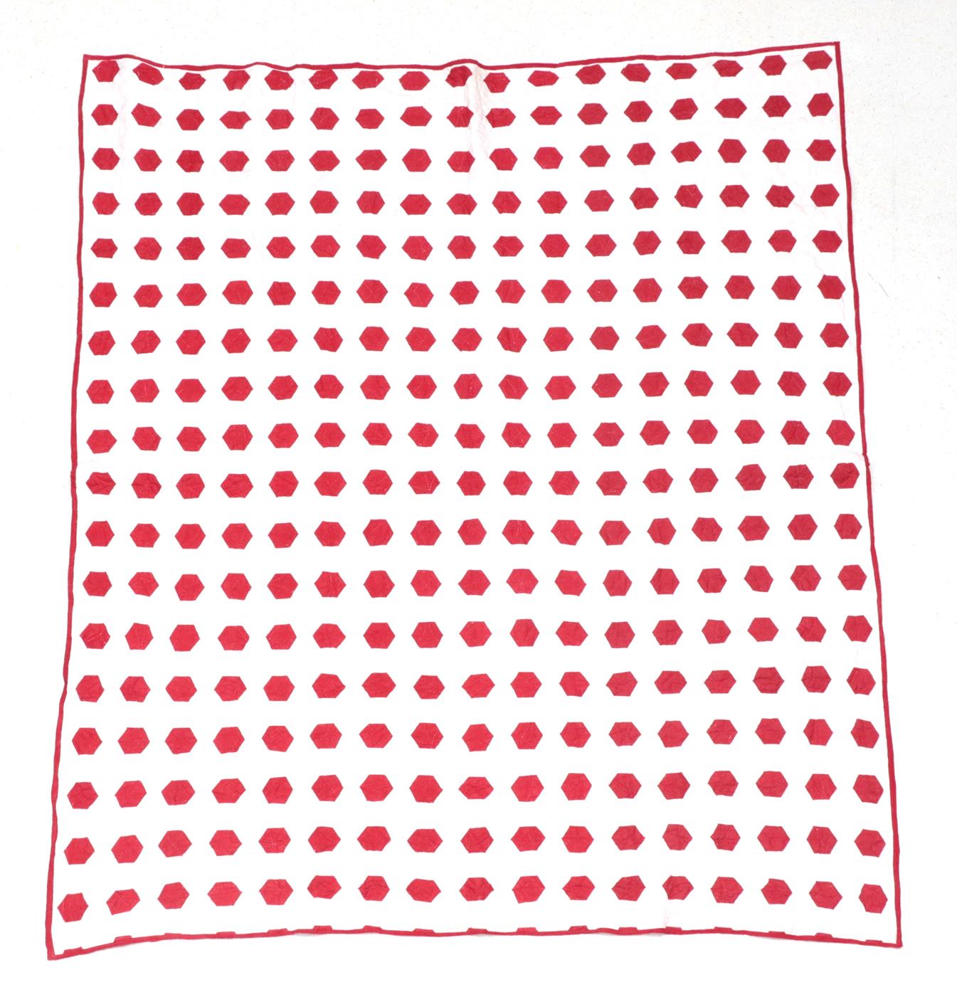 Lot 6023 - Late 19th Century Hexagonal Red and White Country Quilt, hand quilted with circles, leaves and...