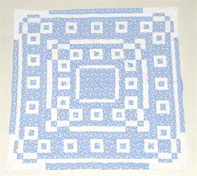 Lot 6034 - Early 20th Century Blue Floral Quilted Bed Cover, designed with white cotton squares  and...