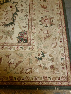 Lot 1249 - Amritsar Design Carpet Probably Lahore The ivory field of large palmettes and flowerheads...