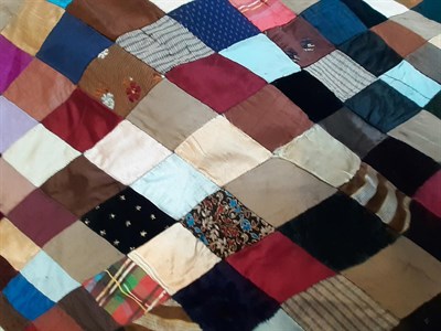 Lot 6037 - Victorian Silk Patchwork, comprising coloured silks in a diamond pattern, central pattern and black