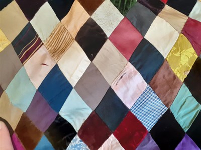 Lot 6037 - Victorian Silk Patchwork, comprising coloured silks in a diamond pattern, central pattern and black