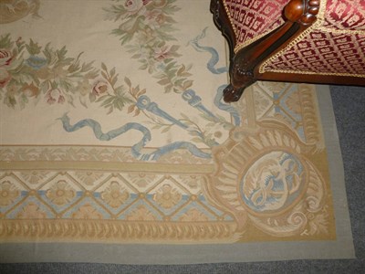 Lot 1251 - Napoleon III Aubusson Design Carpet China The cream field of scrolling ribbons and swags around...