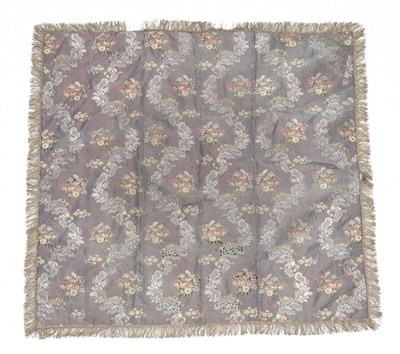 Lot 6059 - 18th Century Silk Brocade Cover of floral woven design, with purple silk to the reverse and...
