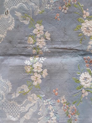 Lot 6059 - 18th Century Silk Brocade Cover of floral woven design, with purple silk to the reverse and...