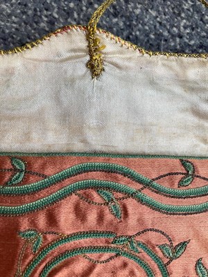 Lot 6061 - 18th Century Rust Red Silk Pocket Book, with decorative green sinuous stem and leaf embroidery with