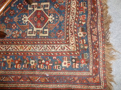 Lot 1252 - Kashgai Rug South West Persia The serrated madder field of stylised plants and flowerheads around a