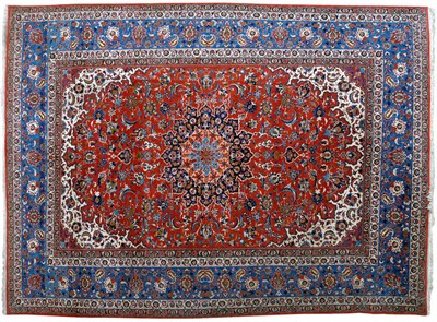 Lot 1253 - Good Isfahan Carpet Central Persia The brick red field of palmettes and leafy vines around a...