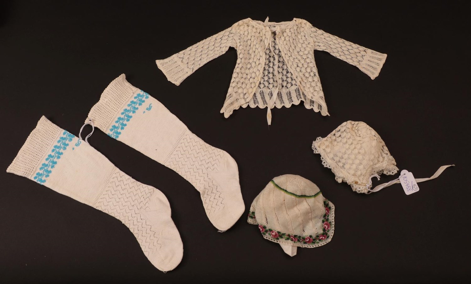 Lot 6079 - Early 19th Century Fine Knitted Baby Jacket and Bonnet, comprising a long sleeved jacket with...