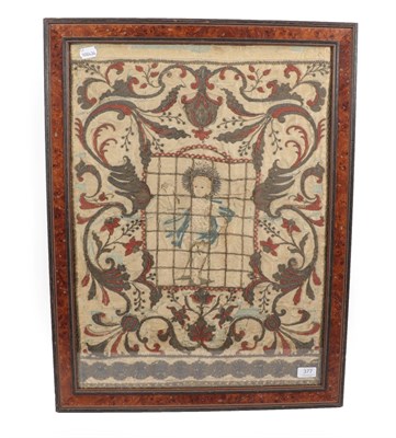 Lot 6109 - A 17th Century Silkwork Panel worked in coloured thread and coral beads with the young Christ...