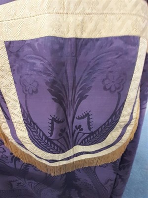 Lot 6116 - Early 20th Century Ecclesiastical Cope in purple silk damask pattern, possibly a Pugin fabric, with
