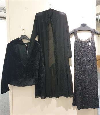 Lot 6125 - Circa 1920s Evening Wear, comprising a black silk sleeveless drop waist dress, with velvet...