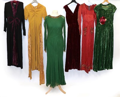 Lot 6137 - Circa 1930s/40s Evening Wear, comprising a green velvet full length dress with capped sleeves,...