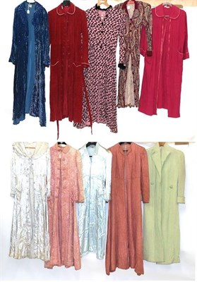 Lot 6141 - Circa 1930s/40s Ladies' Day and Night Robes comprising a silver coloured long sleeved silk robe...