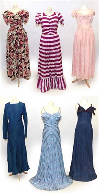 Lot 6144 - Circa 1930s/40s Full Length Evening Dresses, comprising a pink silk brocade dress with capped...