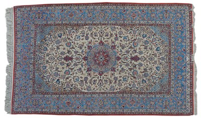 Lot 1261 - Isfahan Rug Central Persia The cream field of scrolling floral vines around a pole medallion framed