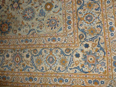 Lot 1262 - Kashan Carpet Central Persia The duck egg blue field with an allover design of scrolling vines...