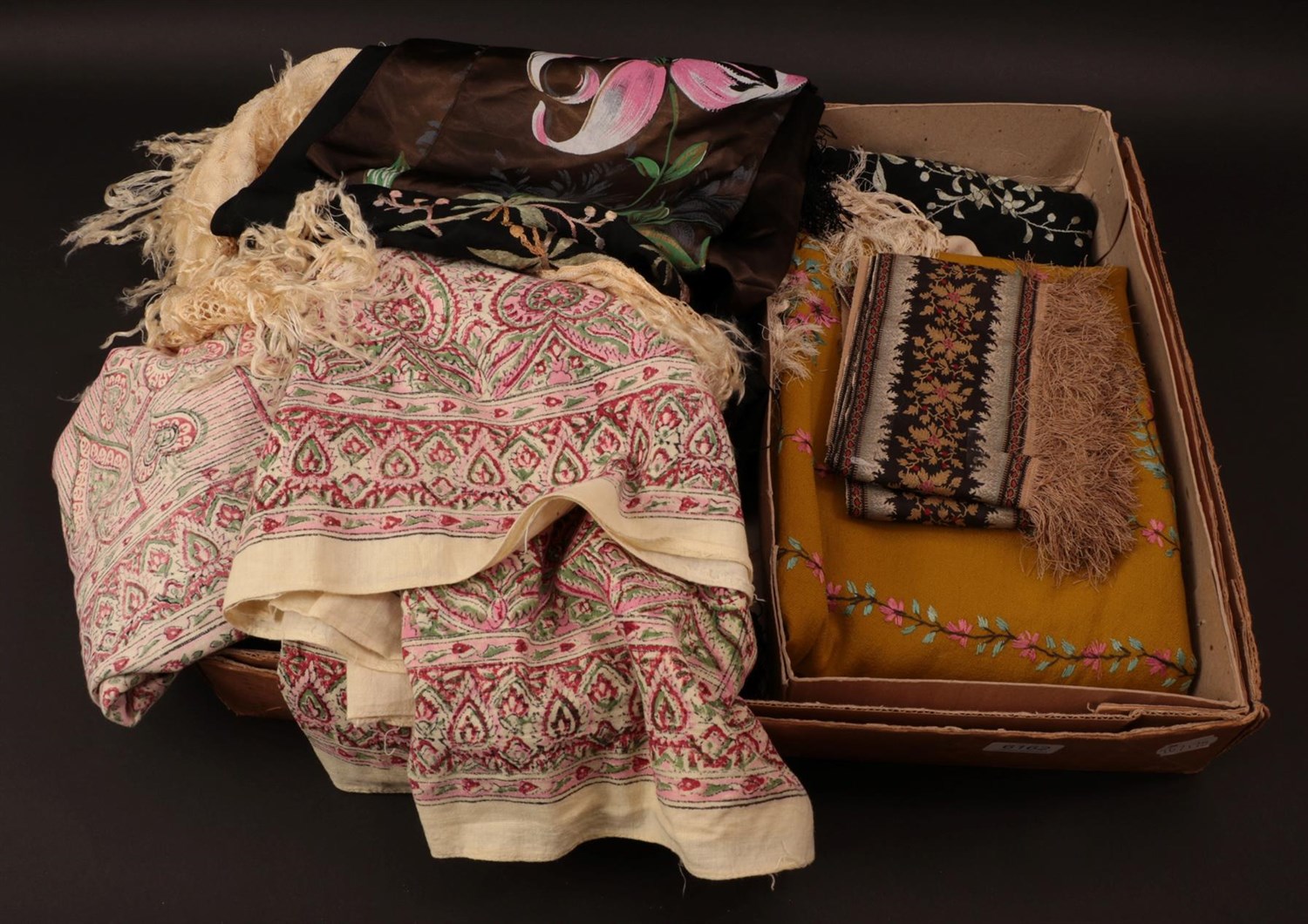 Lot 6162 - Assorted Late 19th/Early 20th Century Shawls, comprising a black silk shawl, a similar example...