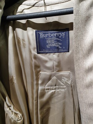 Lot 6193 - Burberry Women's Swing Style Wool Coat, with vertical pockets and raglan sleeves.