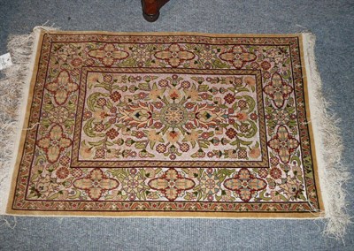 Lot 1267 - Hereke Silk and Brocade Thread Rug  North West Anatolia The field with palmettes and vines enclosed