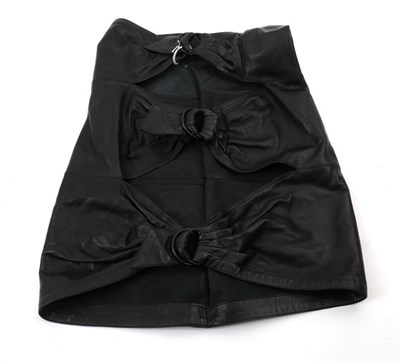 Lot 6210 - Circa 1993/4 Azzedine Alaia Collection Black Leather Skirt, worn with the 'wide flesh-revealing...