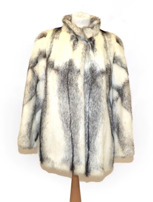 Lot 6215 - A Grey and White Cross Mink Fur Jacket, with Nehru style collar, slit pockets, the grey lining...