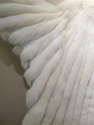 Lot 6217 - A Saga White Fox Fur and Leather Coat, the panels of fur alternated with lengths of white...