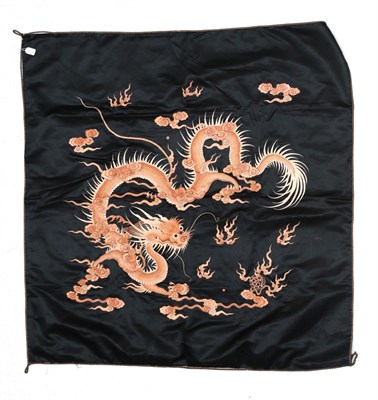 Lot 6248 - Early 20th Century Chinese Black Silk Panel, embroidered with a dragon in peach and cream silk...