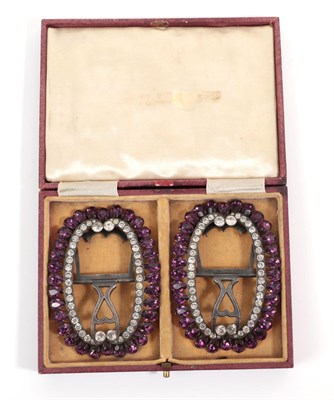 Lot 6257 - A Pair of 19th Century Shoe Buckles, set with clear and amethyst coloured pastes on a metal...