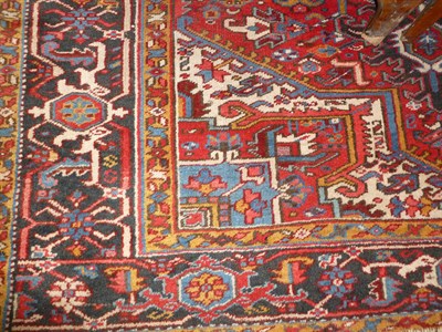 Lot 1274 - Small Heriz Carpet  Persian Azerbaijan The blood red field of angular vines around a typical...