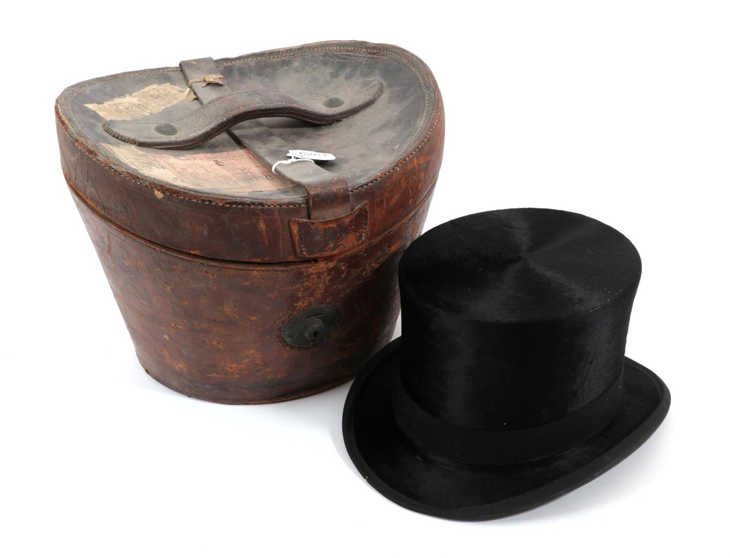 Lot 6284 - W English, Pall Mall Black Silk Top Hat, initialled 'JR', in a brown leather hat case with dark red