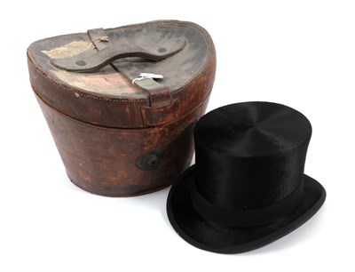 Lot 6284 - W English, Pall Mall Black Silk Top Hat, initialled 'JR', in a brown leather hat case with dark red