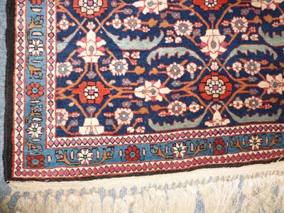 Lot 1276 - Veramin Rug  Central Persia The indigo field of Herati design and stylised palmettes enclosed...