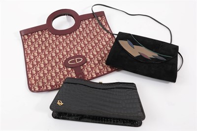 Lot 6296 - A Circa 1980s Dior Black Patent Leather Handbag, with gilt metal mounts and Dior logo,...