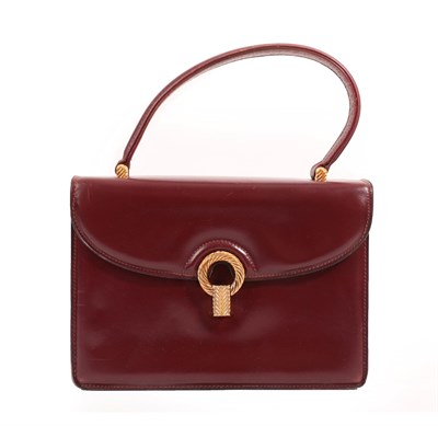 Lot 6316 - Late 20th Century Gucci Dark Red Leather Handbag and Matching Purse, with gilt metal sliding clasp