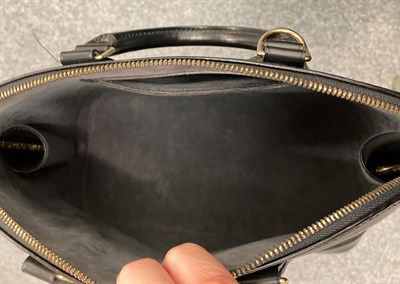 Lot 6340 - Louis Vuitton Black Epi Leather Alma Handbag, with gold tone hard ware, zip fastening, leather...