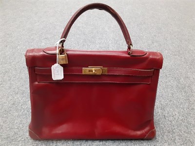 Lot 6347 - Circa 1979 Hermes Burgundy Kelly Leather Bag, with brass hardware, Hermes impressed to the...
