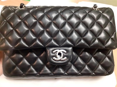 Lot 6349 - Chanel Black Leather Quilted Double Flap Handbag, with chrome fittings, burgundy leather...