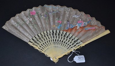 Lot 5010 - A Good 18th Century Ivory Fan with detailed and complex carving to the monture. Slender, the...