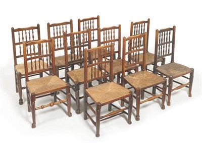 Lot 1283 - A Harlequin Set of Ten Ash Double Row Spindle Back Rush Seated Single Chairs, seven 19th...