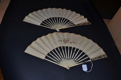 Lot 5018 - An Attractive Mid-18th Century Ivory Fan, the upper guards carved and pierced quite elaborately...