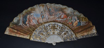 Lot 5021 - A Mid-18th Century Ivory Fan, the monture carved and silvered and gilded in classical style,...