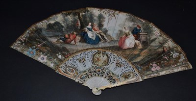 Lot 5025 - An 18th Century Ivory Fan, the slender monture carved, pierced and painted in colour, the gorge...