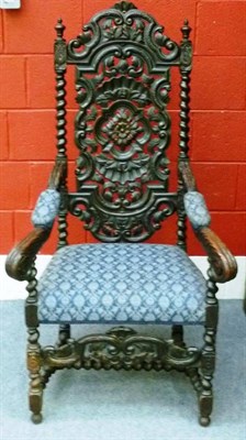 Lot 1284 - A Victorian Charles II Style Carved Oak Open Armchair, profusely carved with spiral turned...