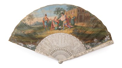Lot 5026 - An 18th Century Ivory Fan, the skin leaf mounted à l'Anglaise and painted with a scene of a...