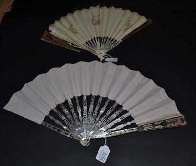 Lot 5028 - A Good Mid-18th Century Ivory Fan, the monture of white mother-of-pearl, silvered and gilded....