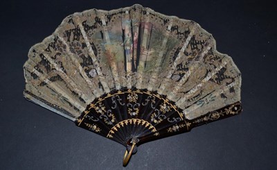 Lot 5040 - A Dramatic Fan, the leaf in aubergine cotton, shaped and cut away to follow the form of blousy...