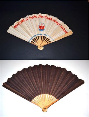 Lot 5043 - An Unusual Paper Fan, initially appearing quite plain, in dark aubergine, but in fact featuring...