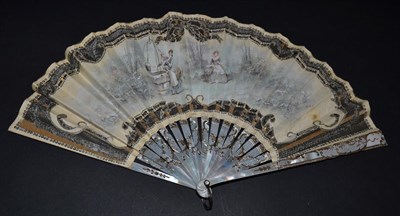 Lot 5048 - An Early 20th Century White Mother-of-Pearl Fan, the leaf with cream background net, overlaid...